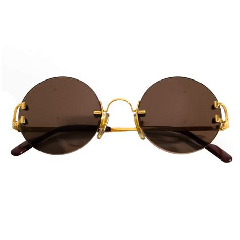 cartier round sunglasses 90s gold|gold cartier glasses men's.